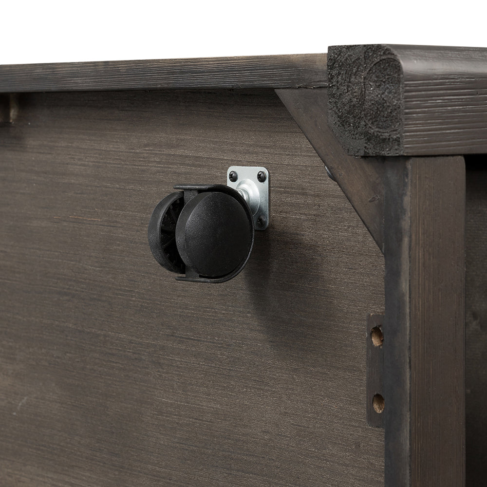 Dark wood dresser with swivel casters adding mobility to furniture storage