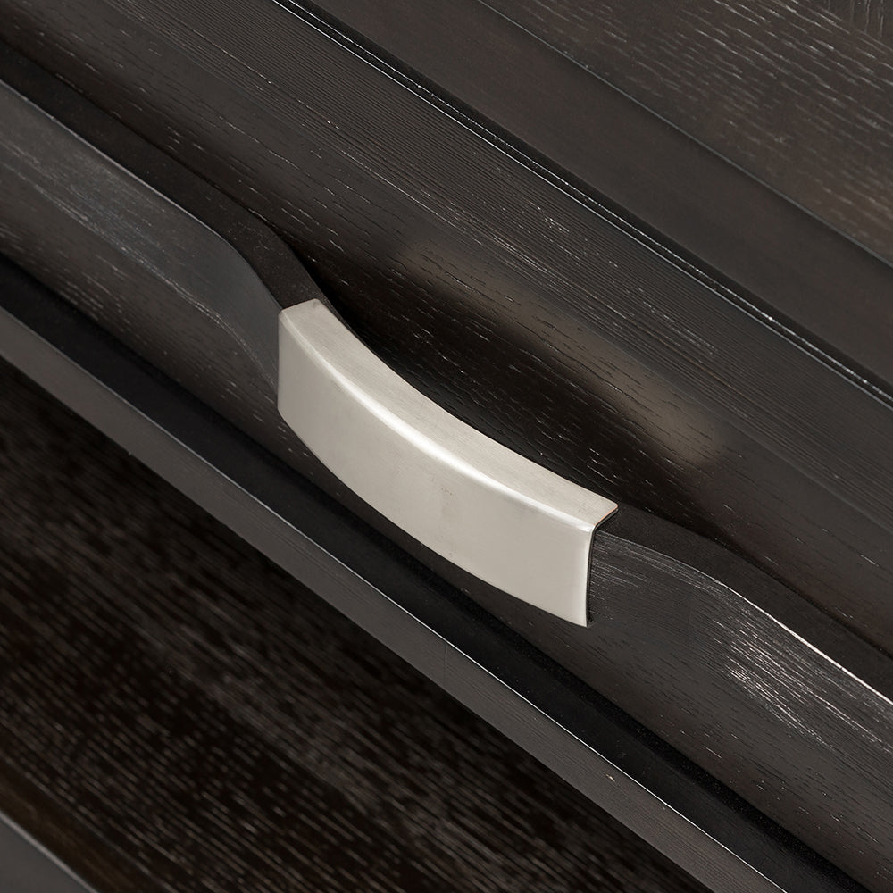 Dark wood dresser drawer with brushed nickel pull handle