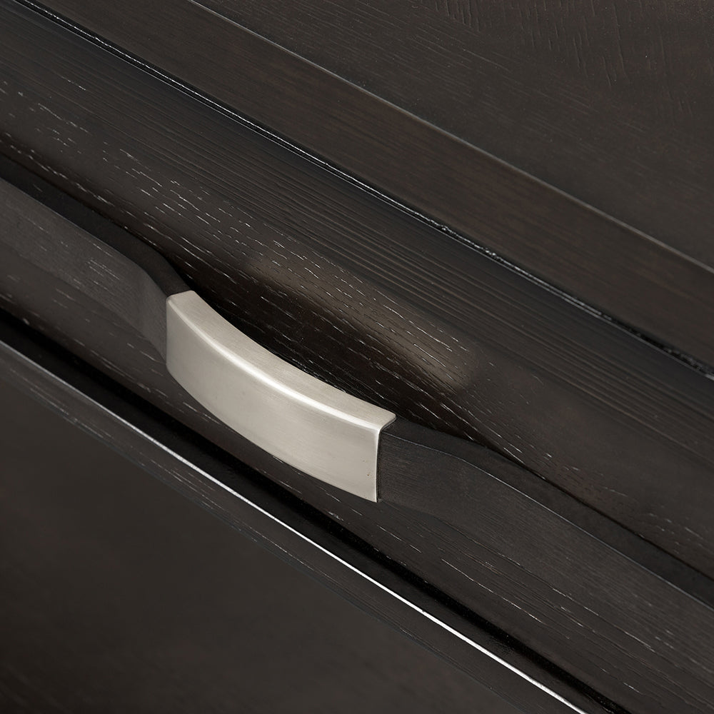 Dark wood dresser drawer with brushed nickel pull handle
