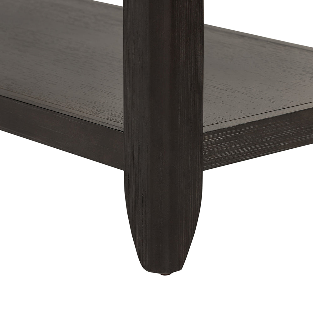 Dark stained wood side table leg with subtle vertical grooving