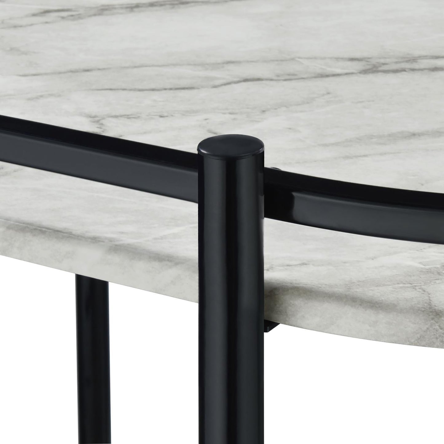 Round marble coffee table top with black metal legs and frame detail