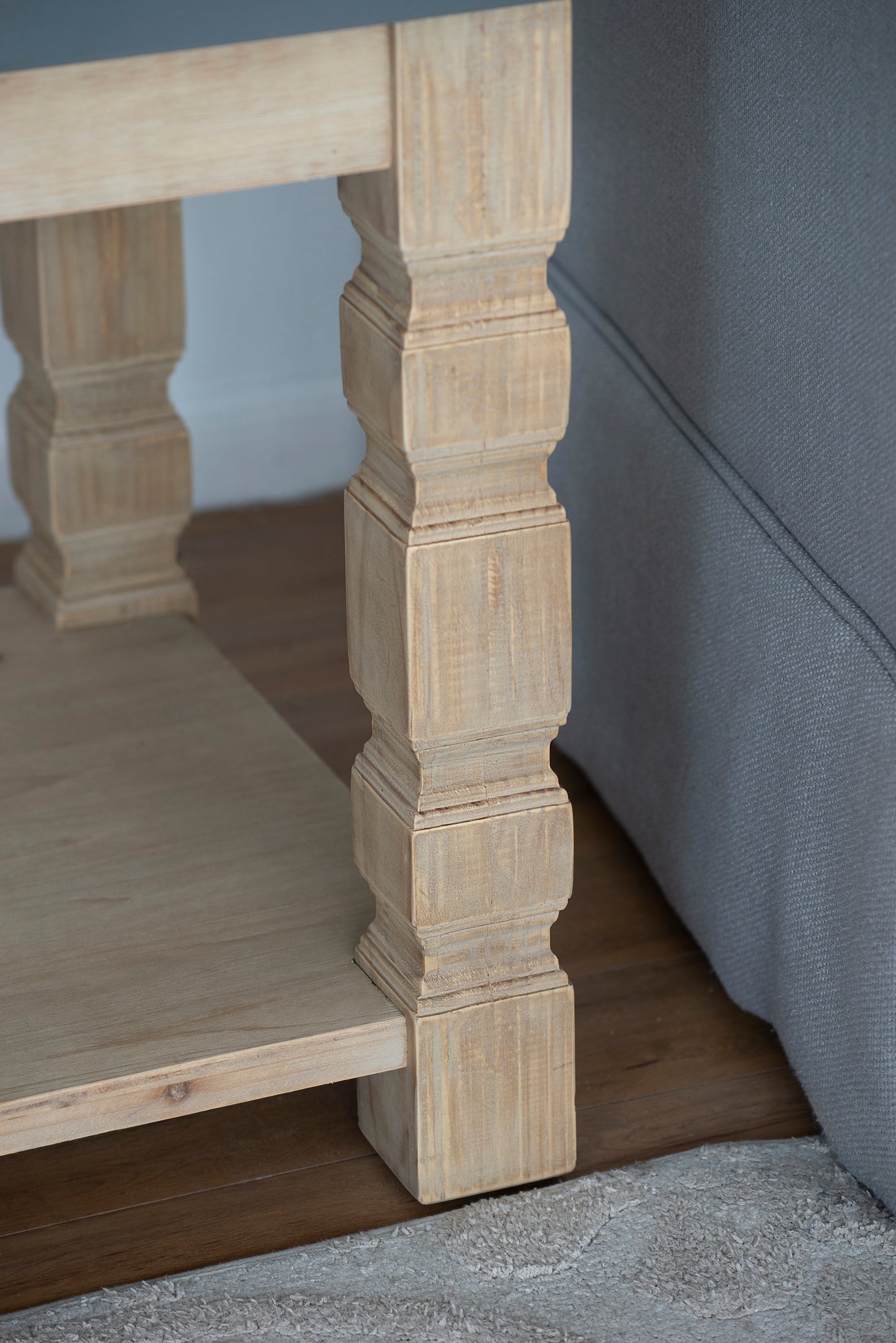 Rustic farmhouse side table with turned wood leg and light oak finish