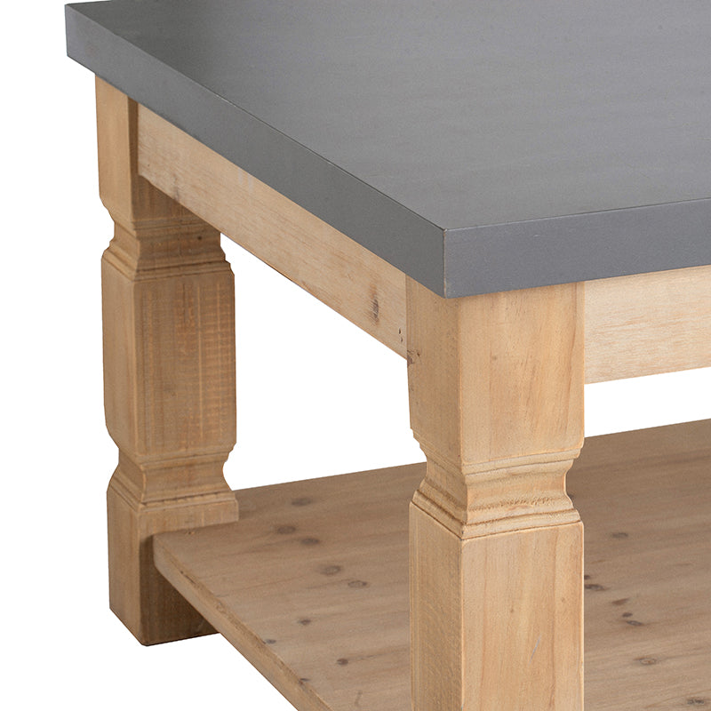 Farmhouse style coffee table with gray top and natural wood legs and shelf
