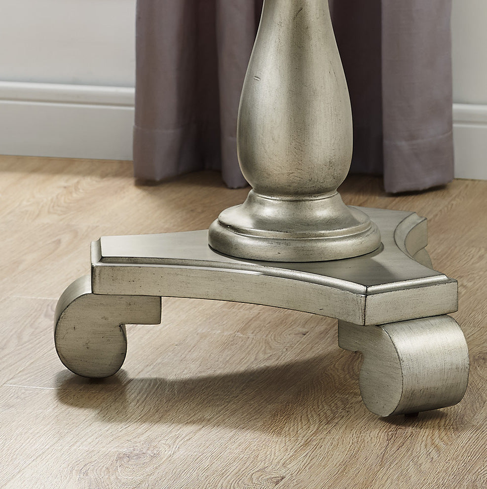 Ornate silver pedestal base with scroll feet for a decorative table antique finish