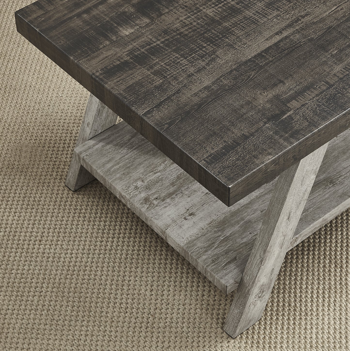 Rustic dark wood coffee table with distressed finish and lower shelf