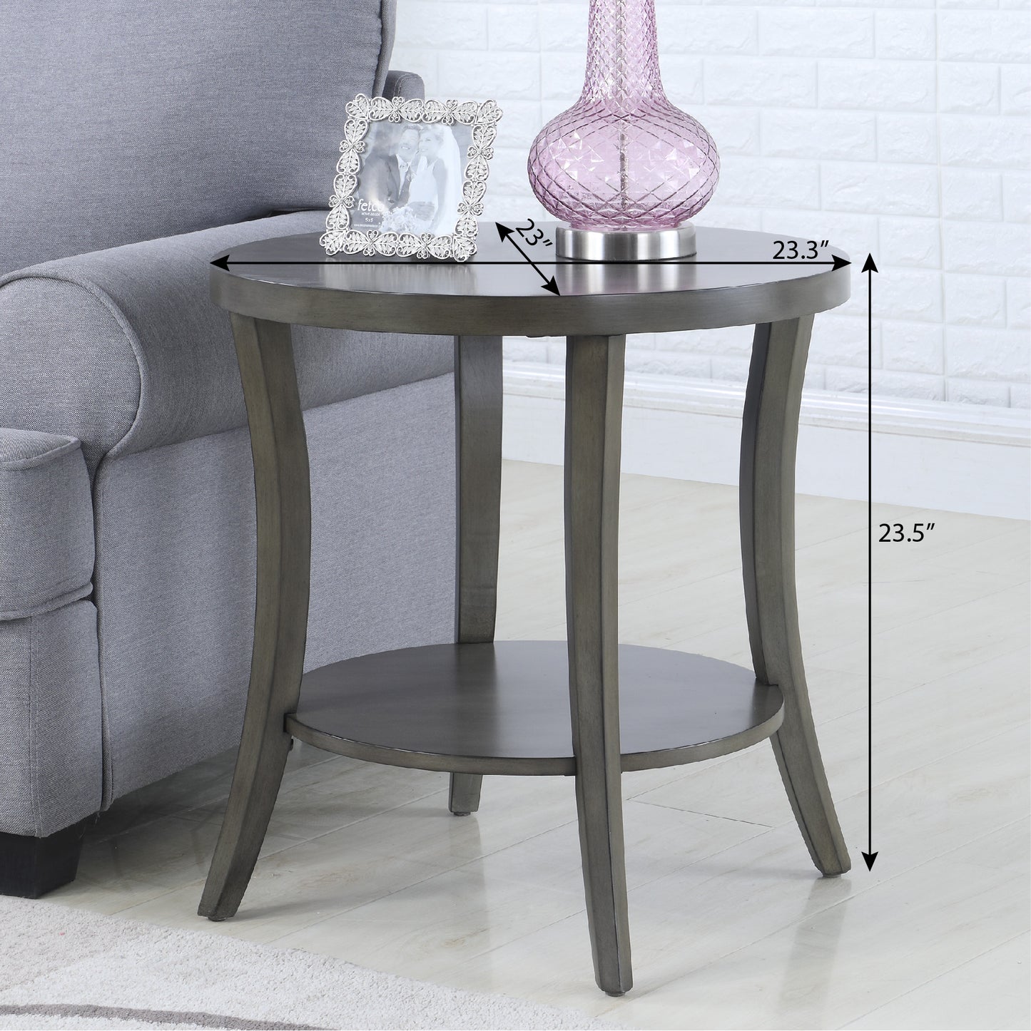 Gray round end table with two shelves ideal for living rooms
