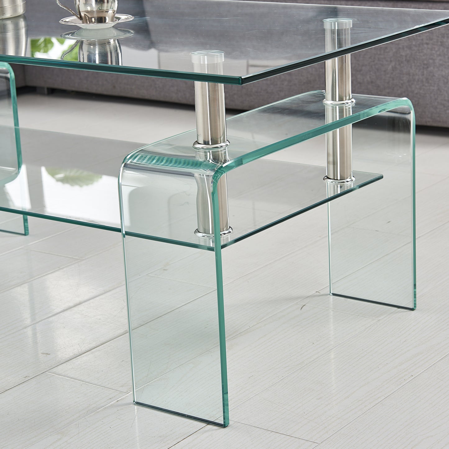 Curved glass coffee table with chrome legs two tiers for storage