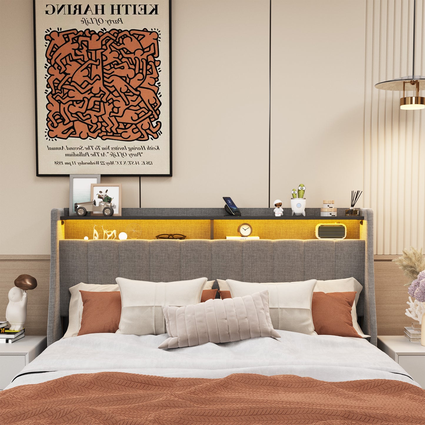 Gray upholstered headboard with builtin LED lighting and storage shelves