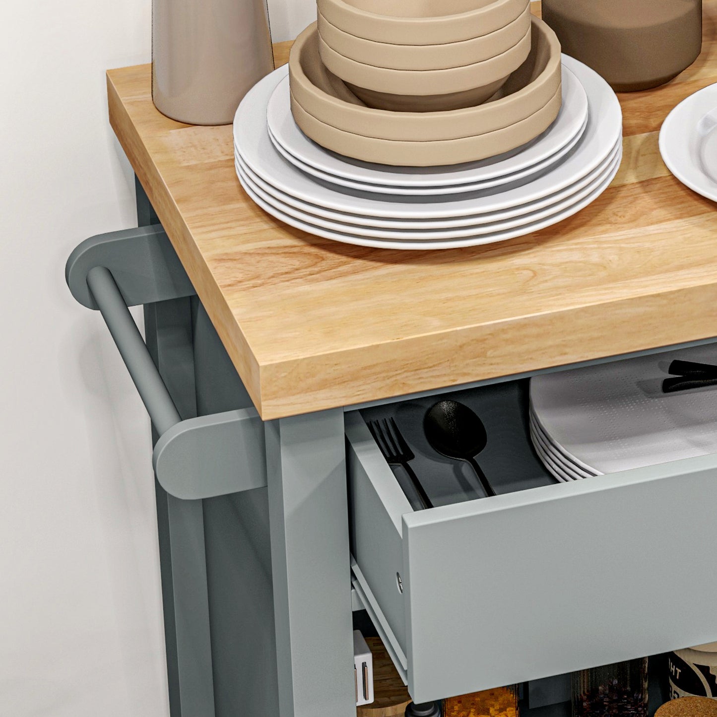 Stacked white and beige ceramic bowls on a wooden countertop