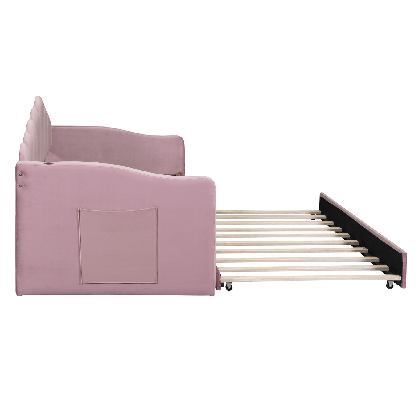 Pink velvet daybed with pullout trundle and integrated storage pocket