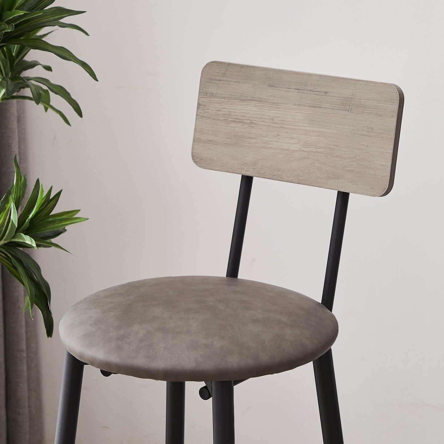 Gray faux leather bar stool with a light wood grain backrest