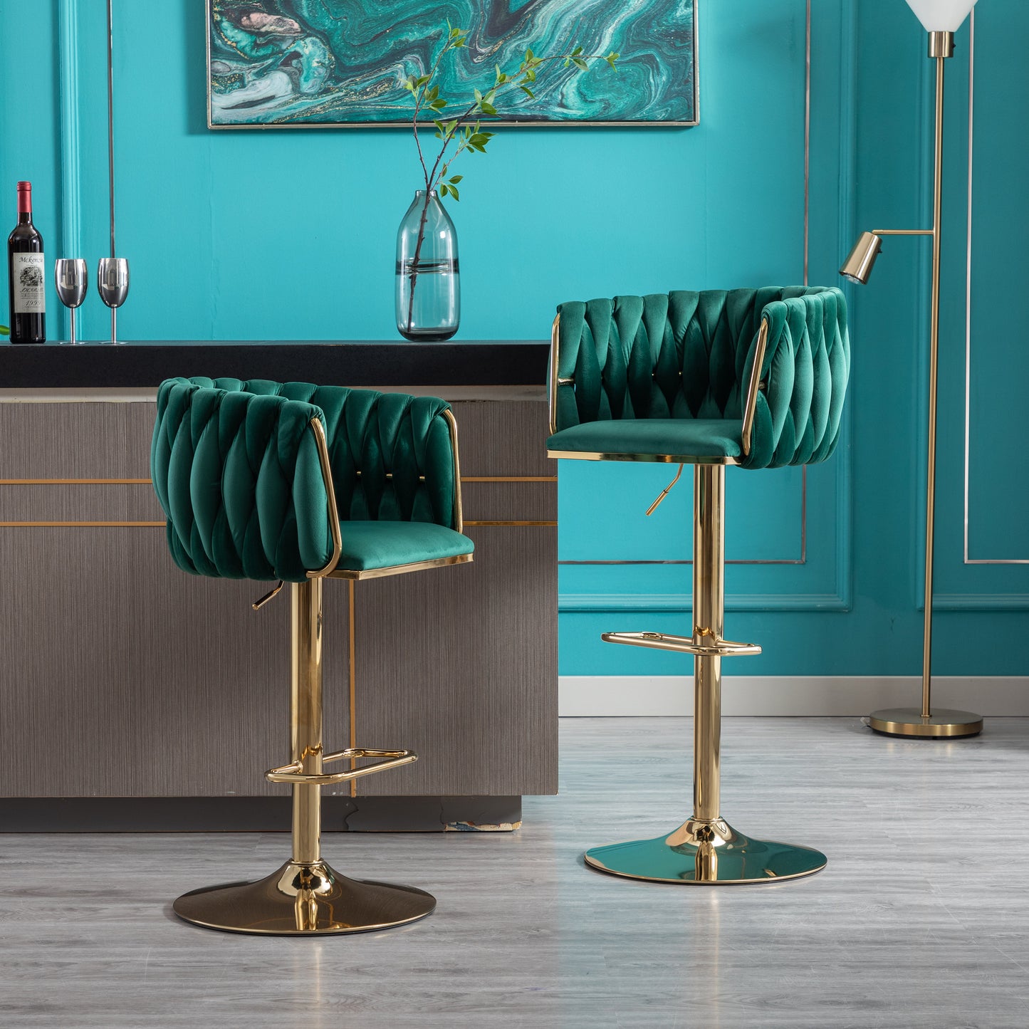 Emerald green velvet bar stool with tufted back and gold base