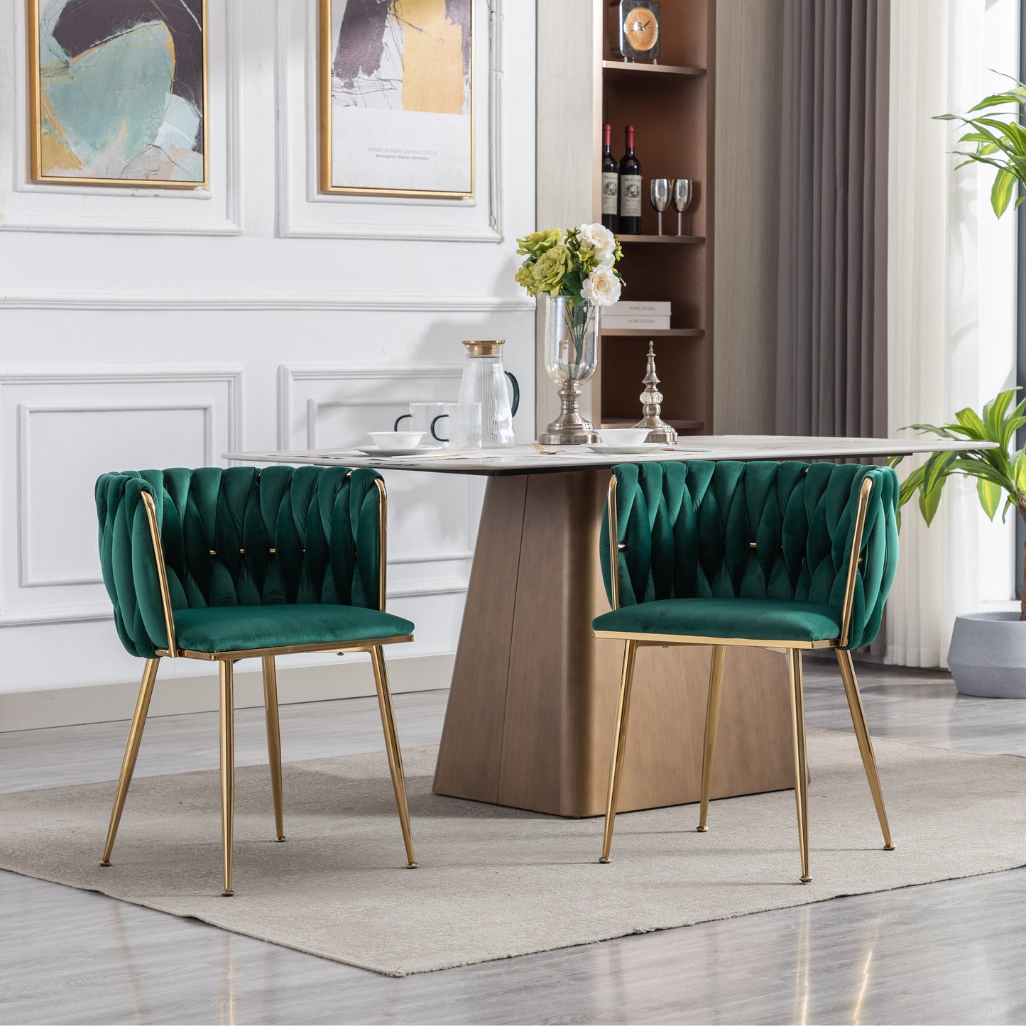 Emerald green velvet dining chair with tufted back and gold legs