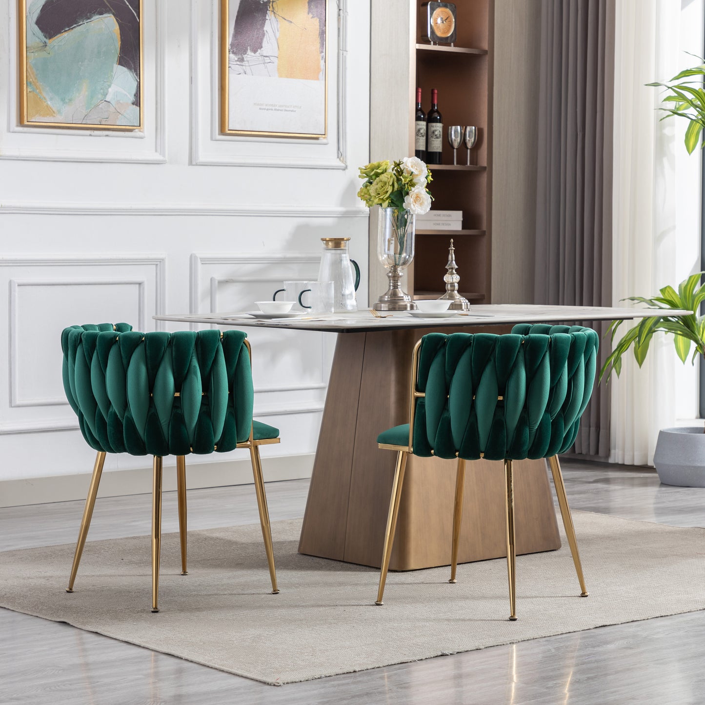 Emerald green velvet dining chair with gold legs and intricate tufting