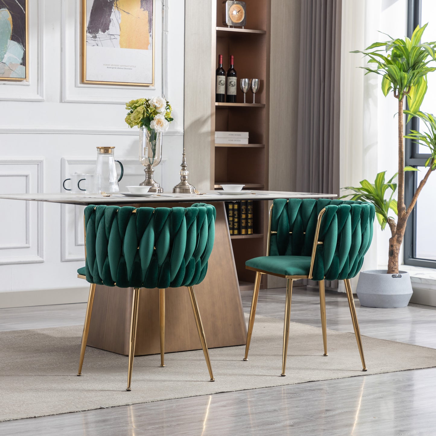 Emerald green velvet dining chair with gold legs and pleated design