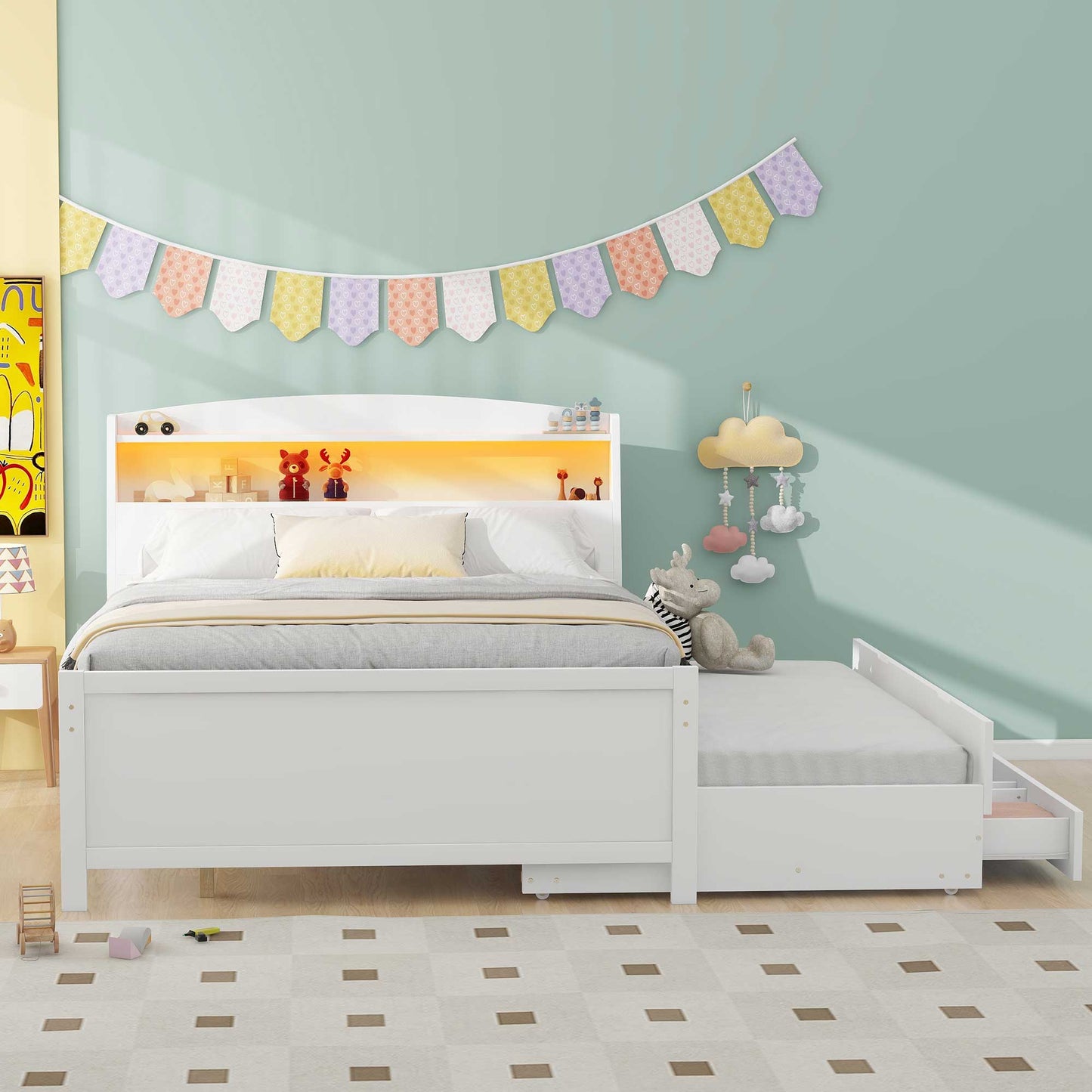 White twin bed frame with a pullout trundle bed and builtin bookshelf headboard with warm LED lighting