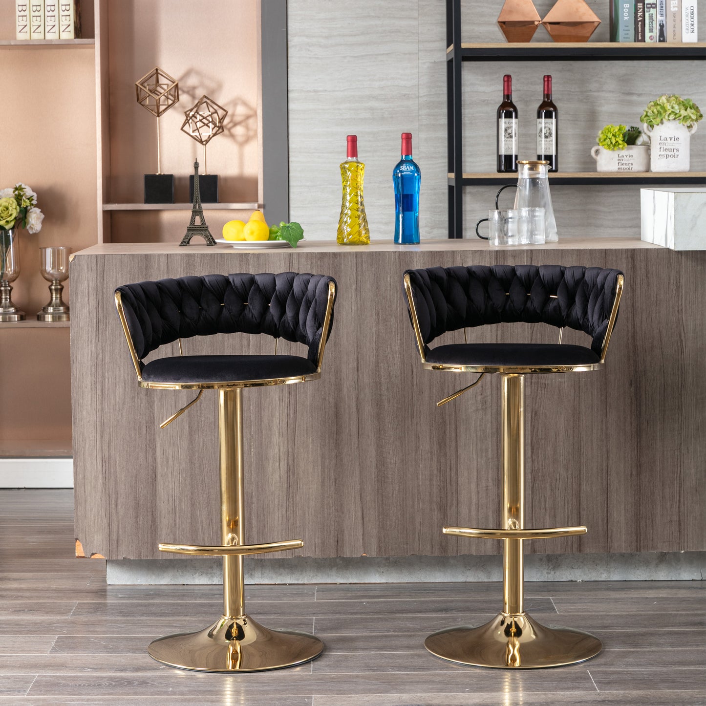 Plush black velvet tufted bar stool with gold adjustable base