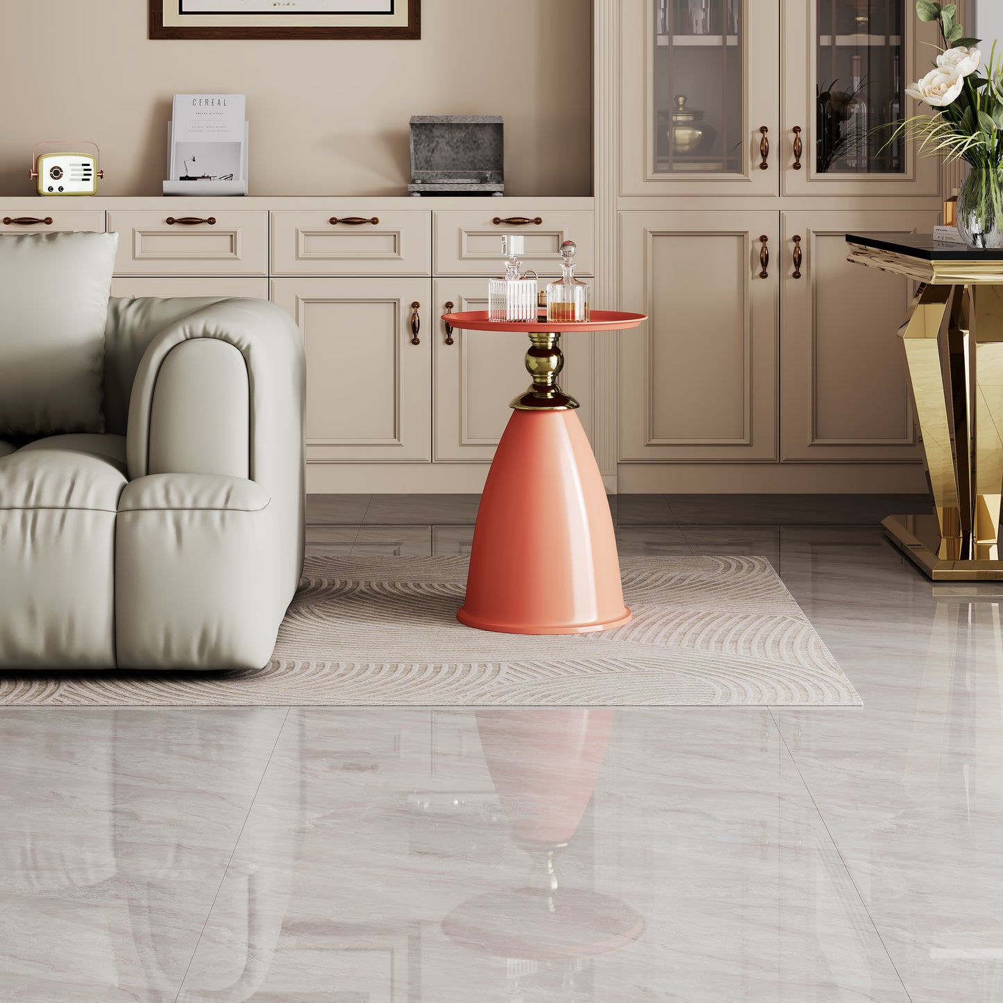 Modern coral accent side table with gold accents and glass decanters