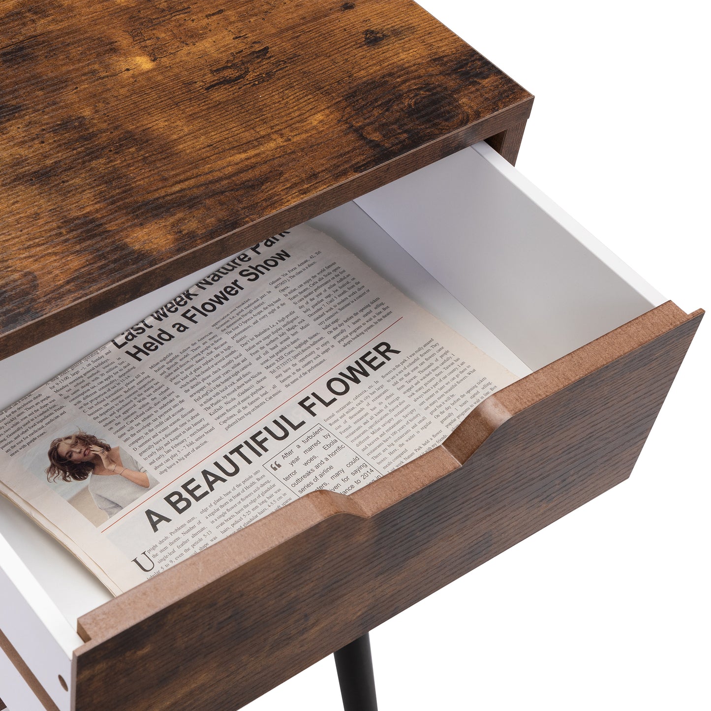 Rustic wood finish nightstand with open drawer revealing newspaper article