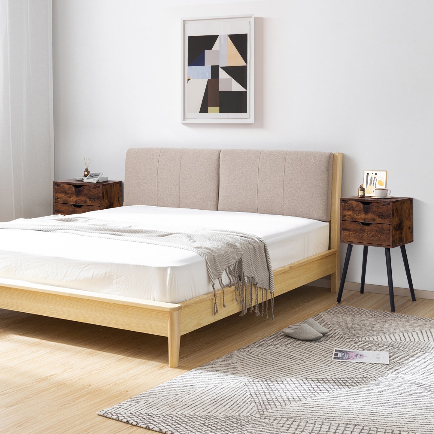 Wooden bed frame with upholstered neutral headboard and white bedding
