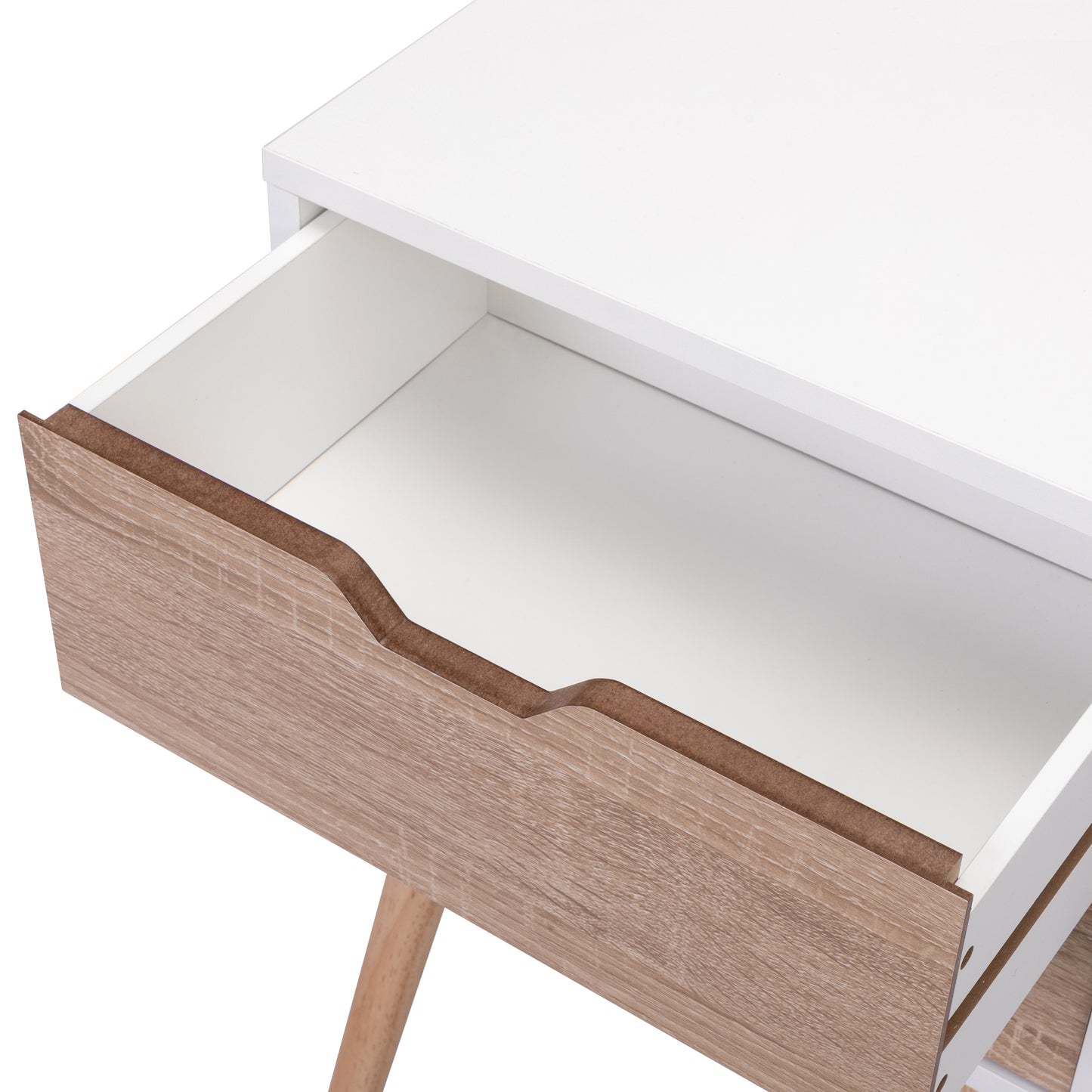 Open white drawer with light wood grain front detail on a modern nightstand