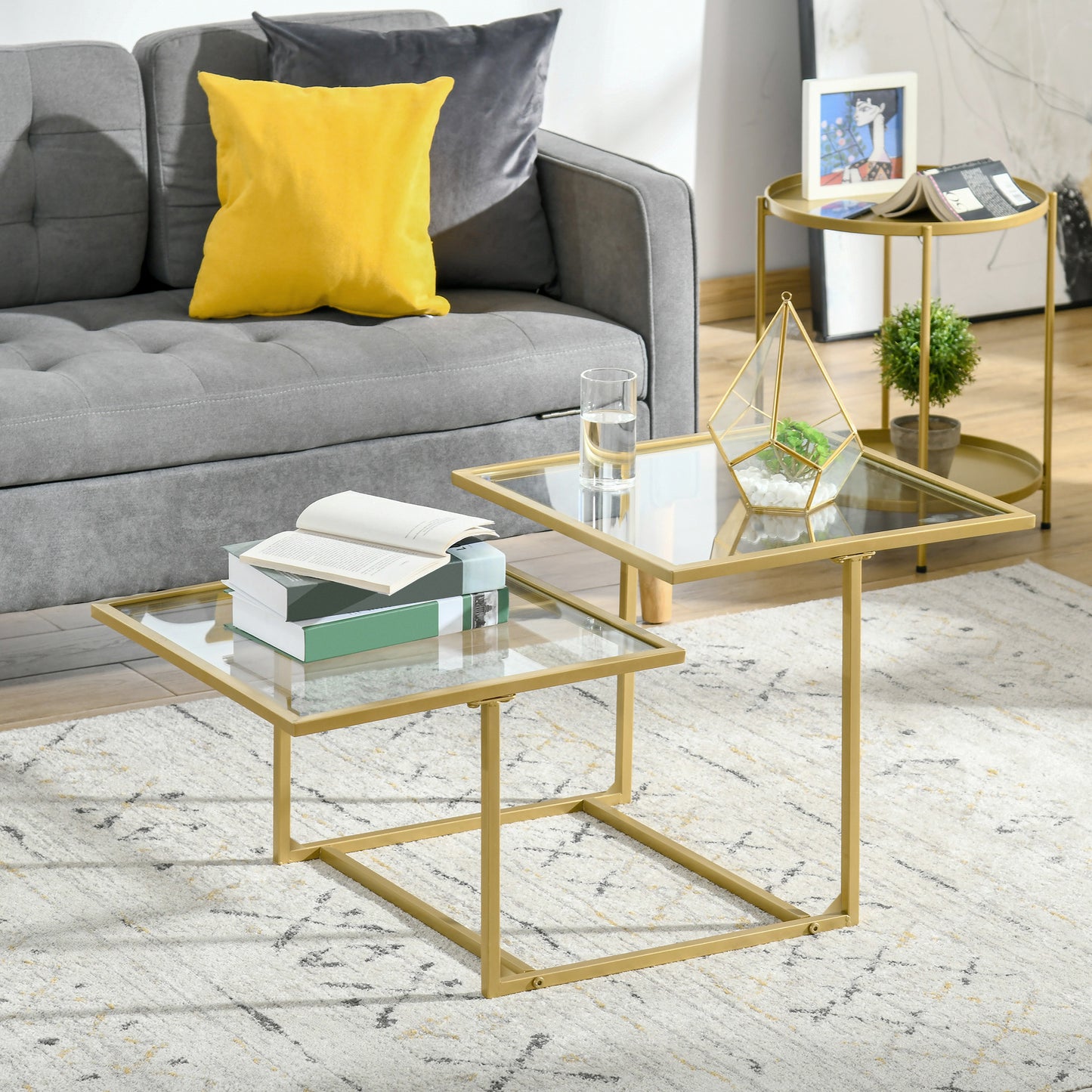 Gold metal frame nesting coffee table with glass tops
