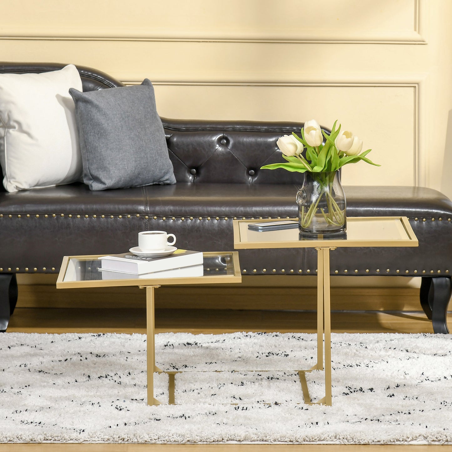 Gold nesting side tables with mirrored tops ideal for living room accent