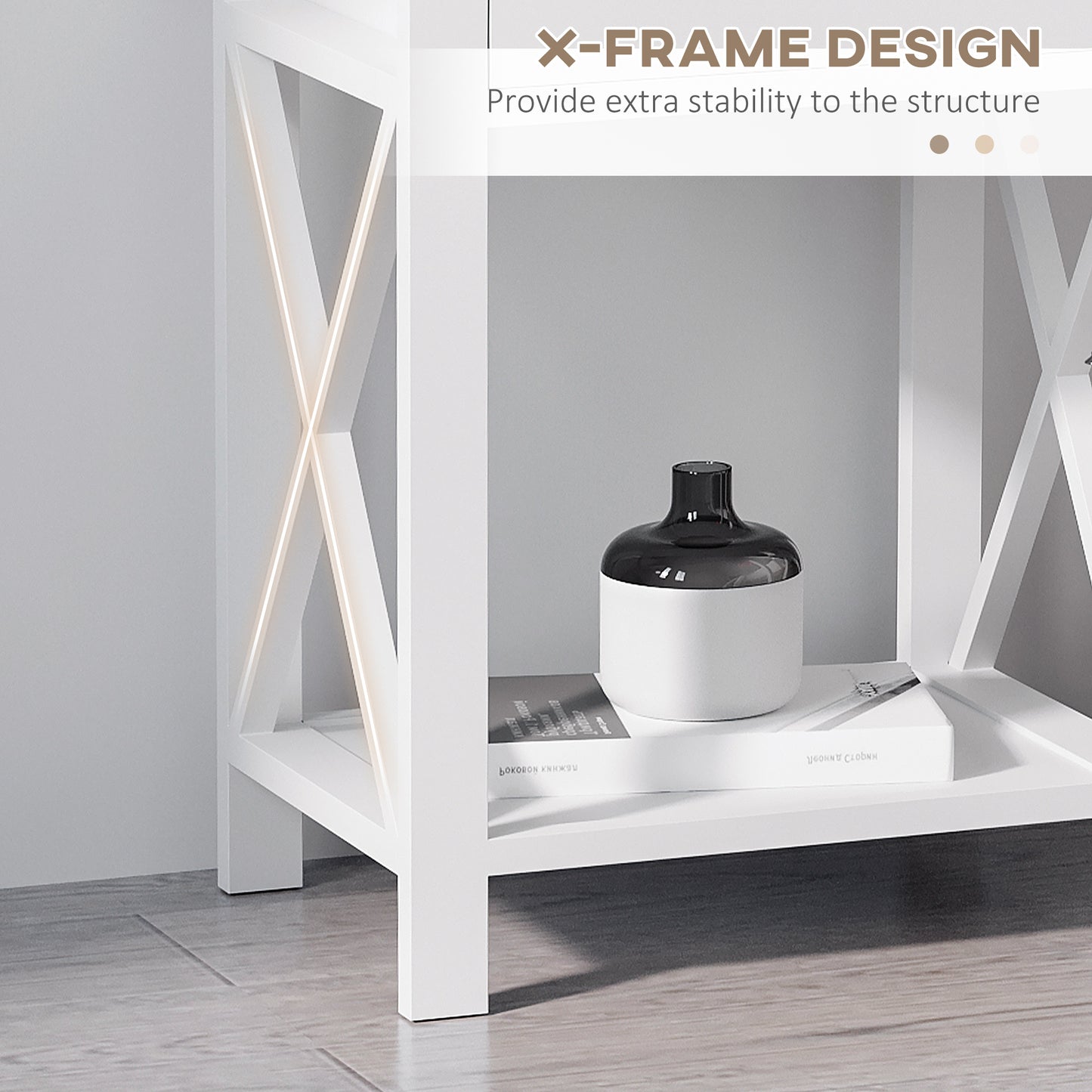 White Xframe side table with a modern twotone vase on top accentuating stability