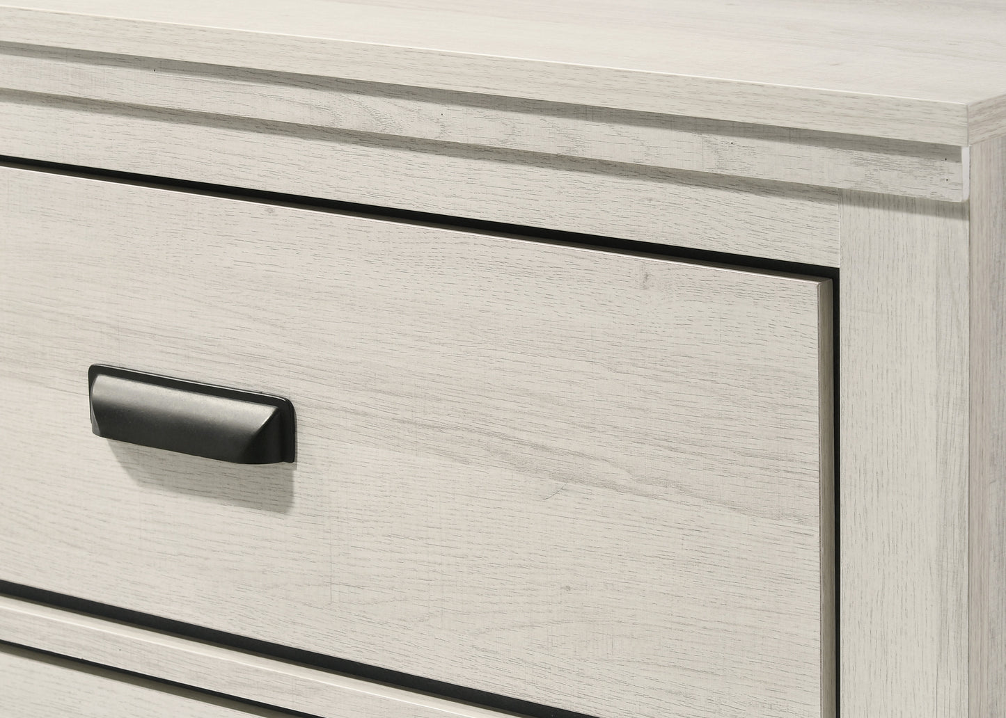 Light oak dresser with black handle featuring clean lines and modern design