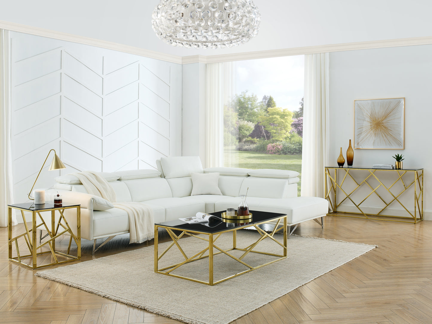 Sleek white leather sectional sofa with modern gold accents and a black glass coffee table