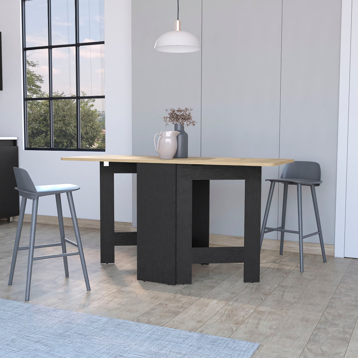 Modern gray bar stools with metal legs flanking a dark wood dropleaf table