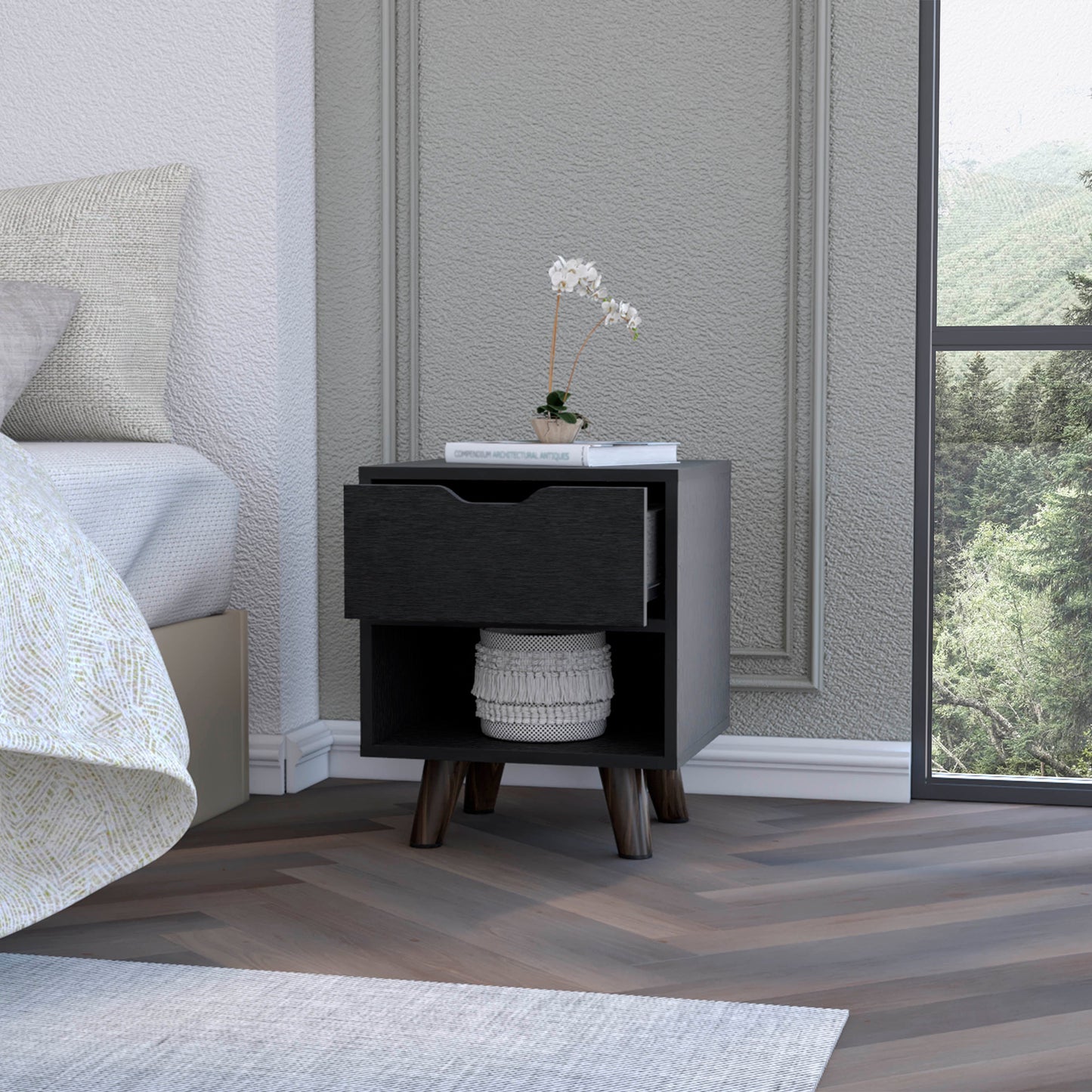 Modern black nightstand with one drawer and an open shelf holding a decorative basket