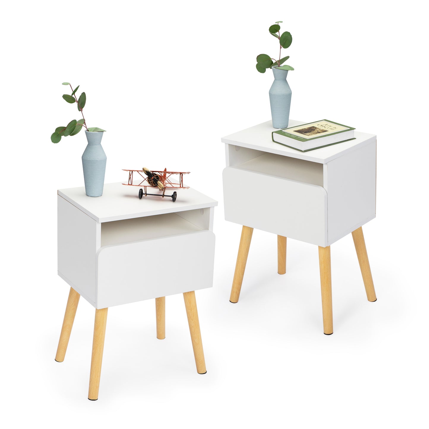 White midcentury modern nightstand with tapered legs and open shelf