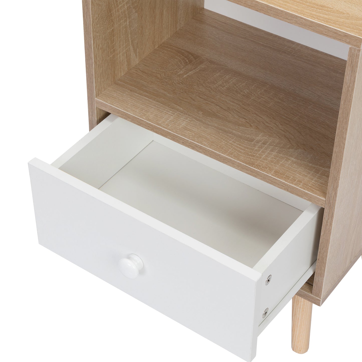 Open white drawer on light oak bedside table with tapered wooden legs