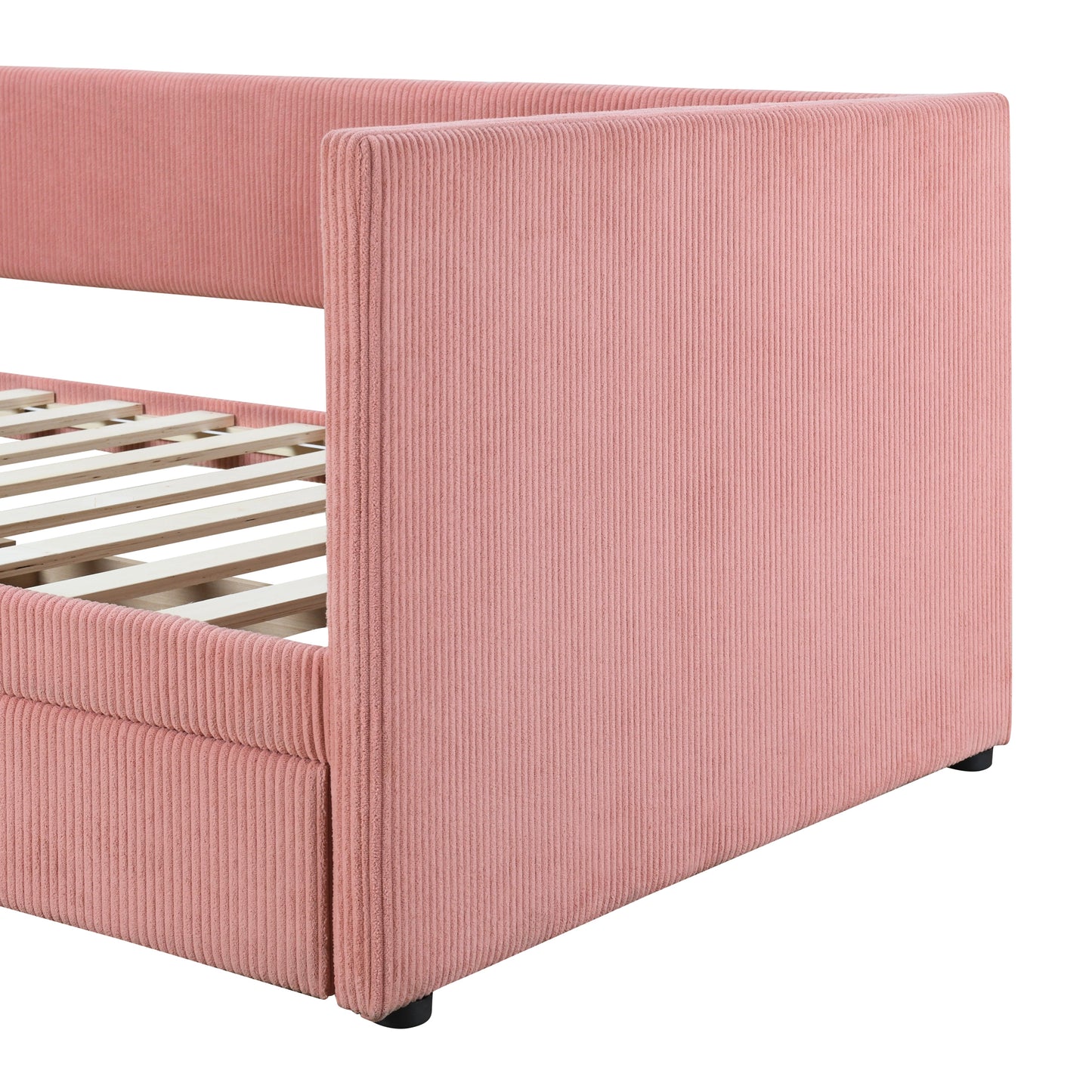 Pink corduroy sofa bed detail showing ribbed texture and wooden slats
