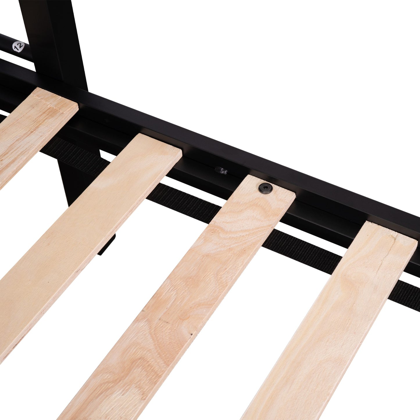 Closeup of wooden slats and black metal frame for a platform bed