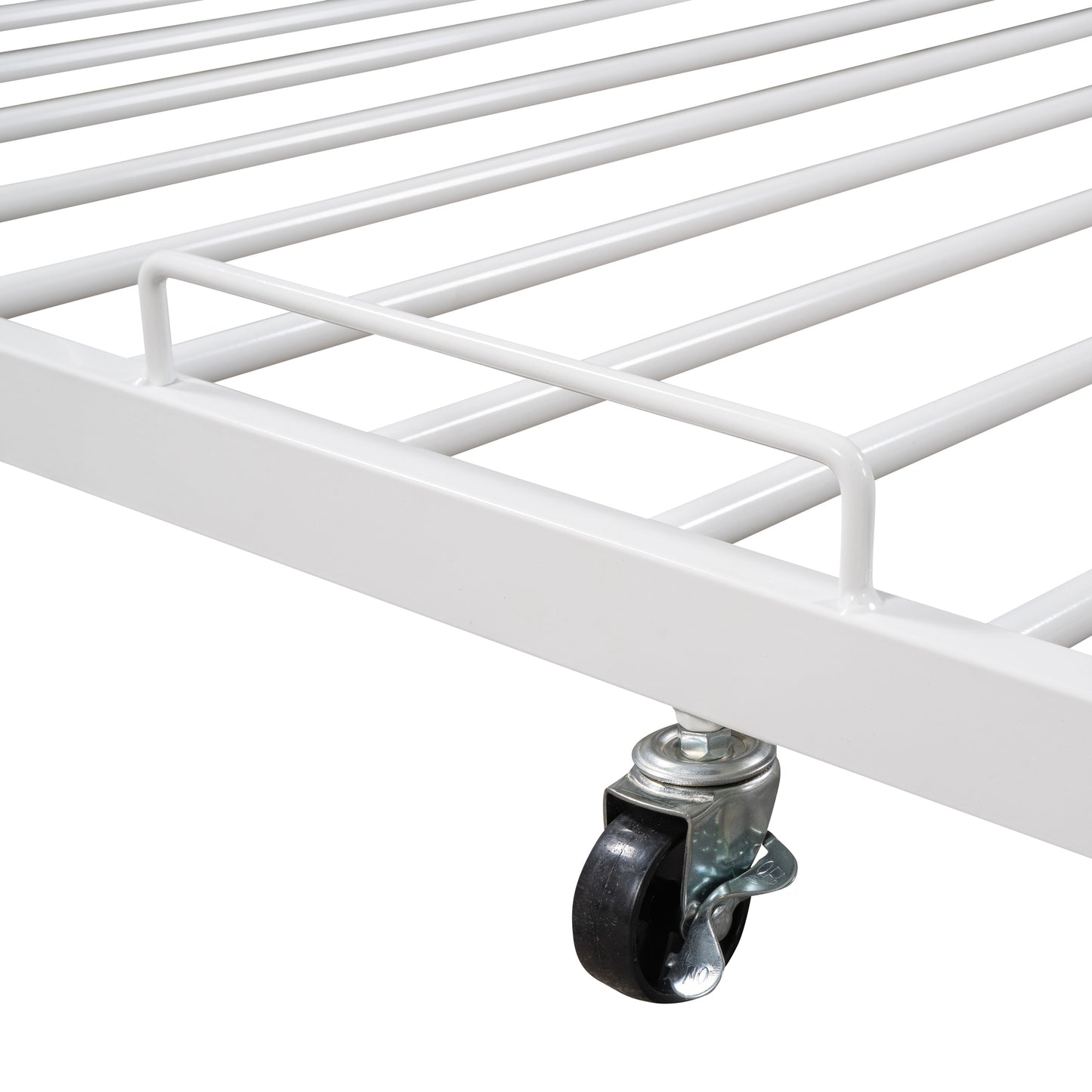 White metal bed frame detail with rolling caster wheel