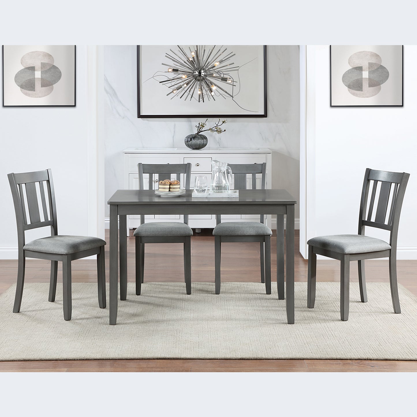 Gray wooden dining table set with upholstered chairs for small spaces