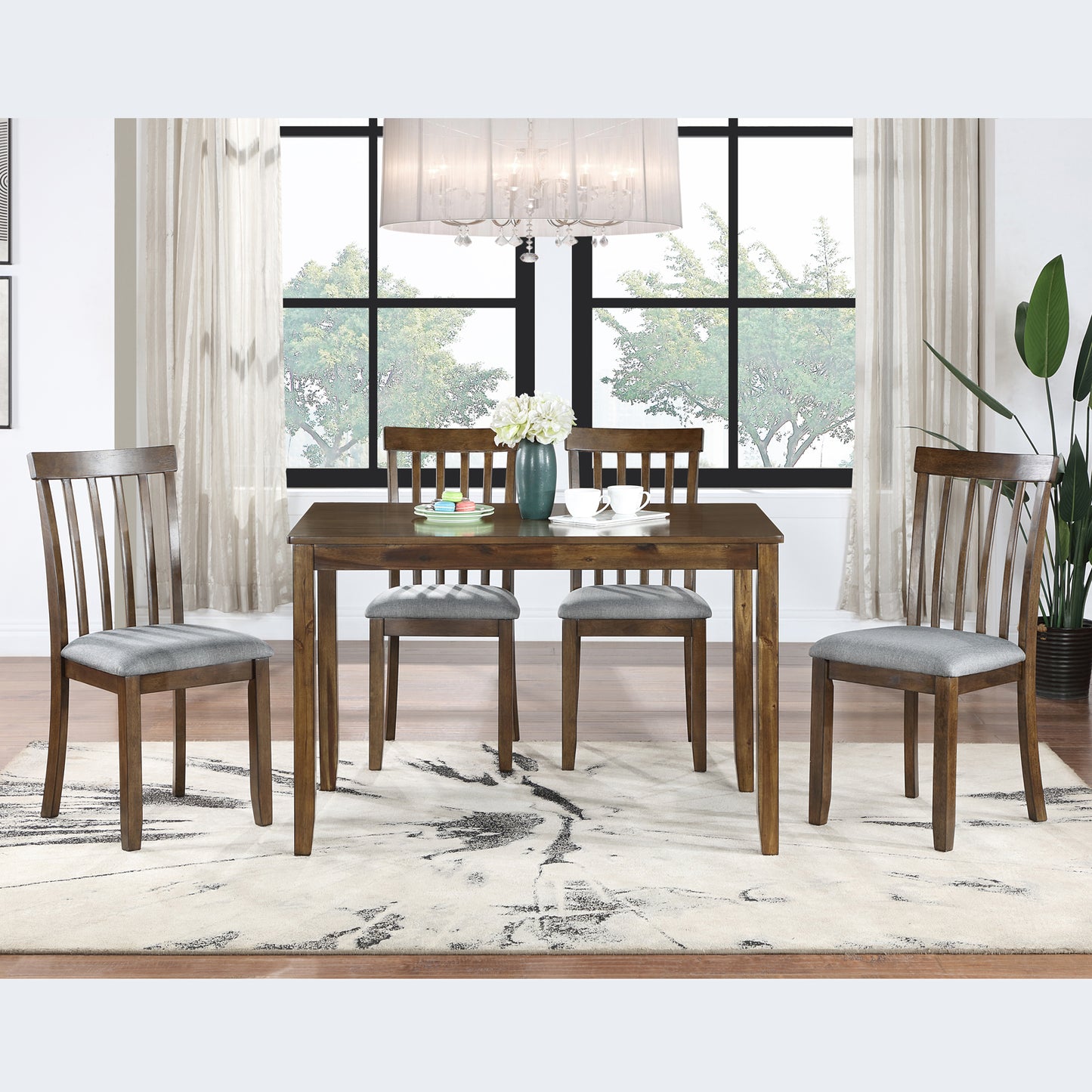 Wooden dining table set with four chairs and upholstered seats