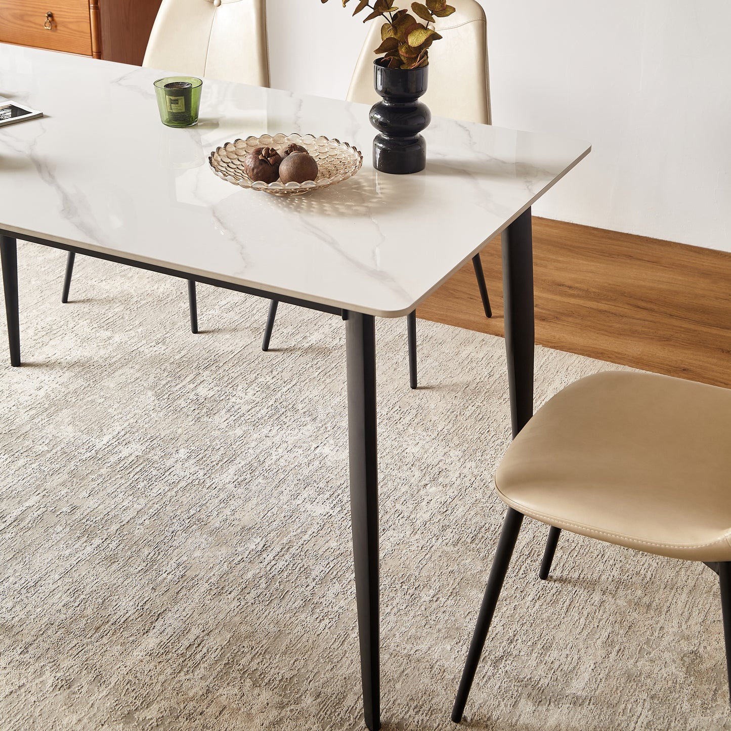 Modern white marble top dining table with black metal legs