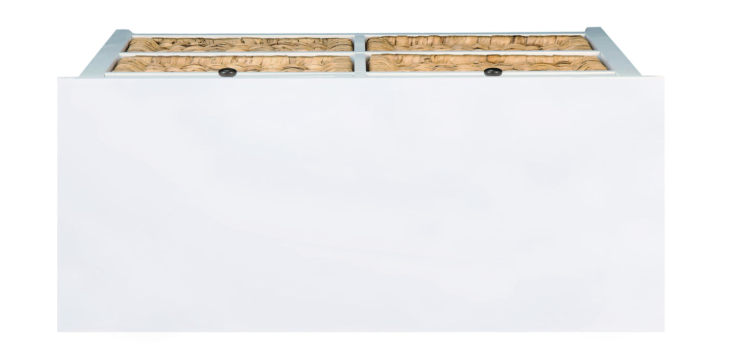 White dresser with four woven seagrass drawers and black knobs