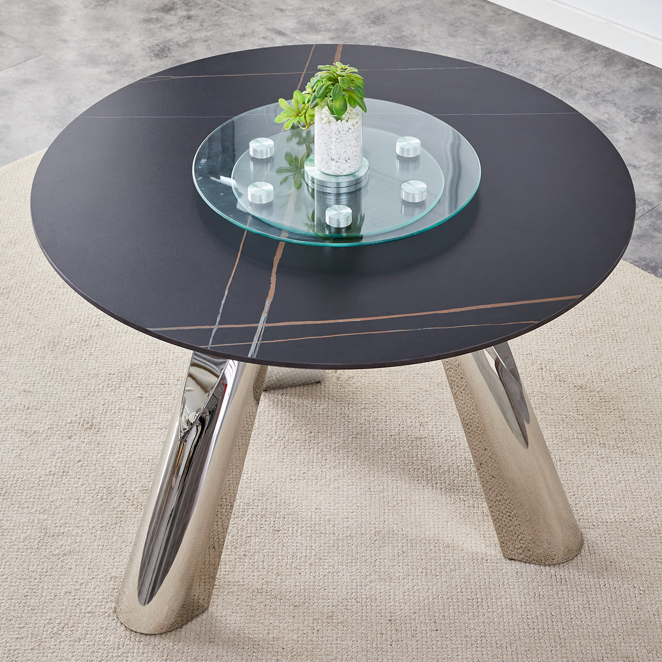 Round black ceramic dining table with gold veining and rotating glass Lazy Susan