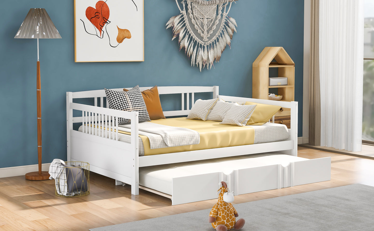 White wooden daybed with pullout trundle and yellow bedding