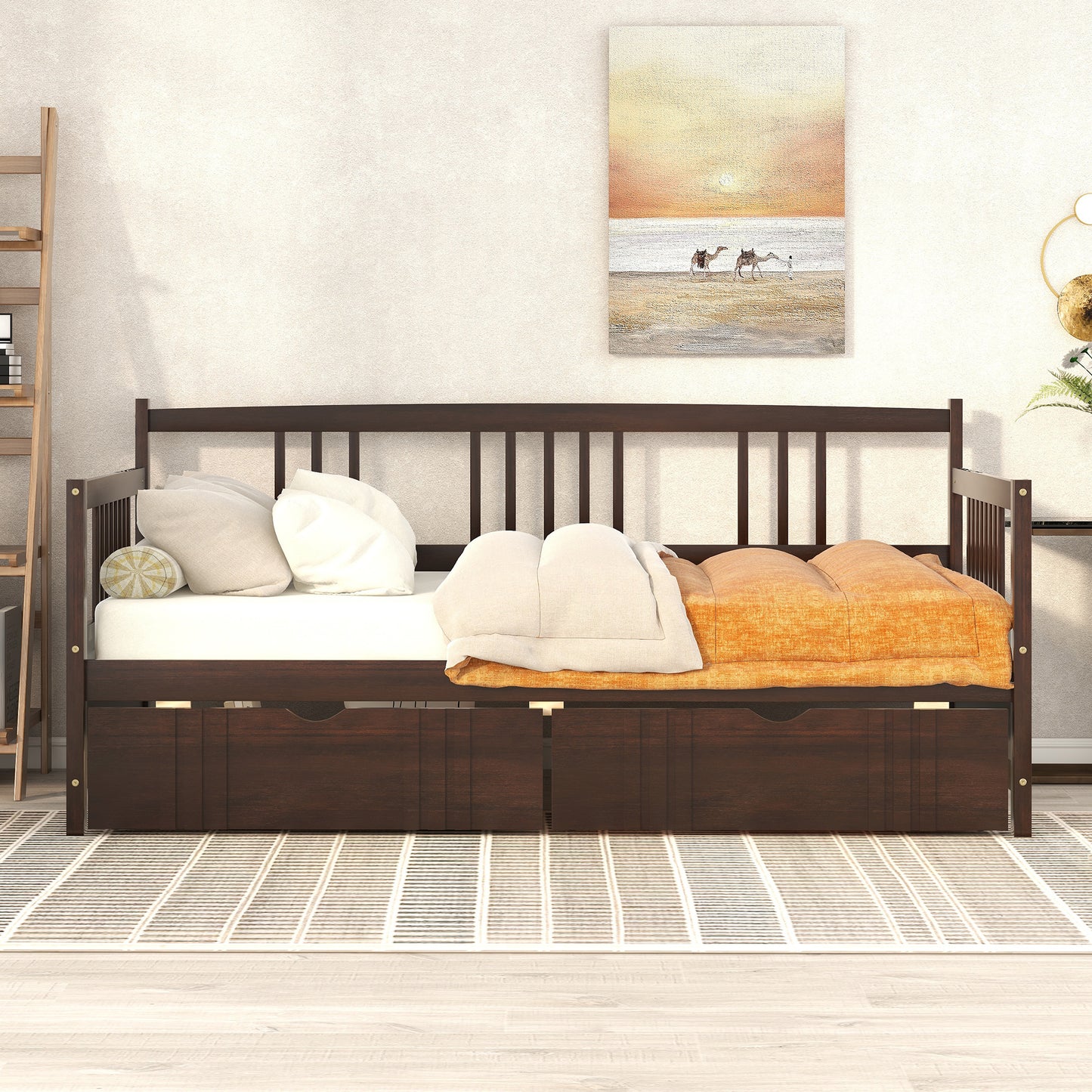 Dark wood daybed with three drawers and ivory bedding