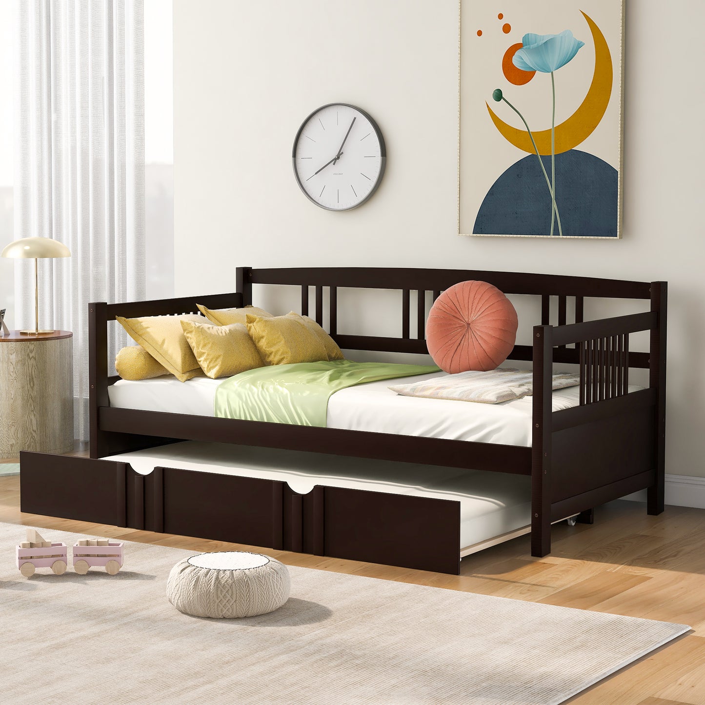 Dark brown wooden daybed with trundle featuring slatted sides and a comfortable mattress for small spaces