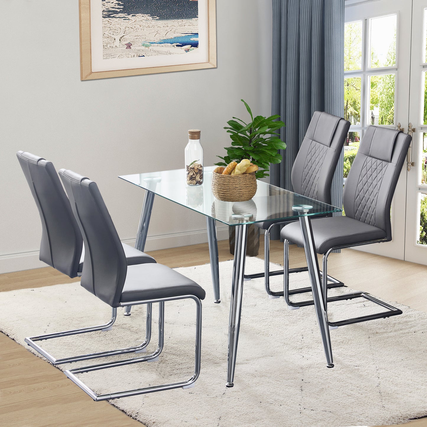 Set of modern grey faux leather dining chairs with chrome sled legs