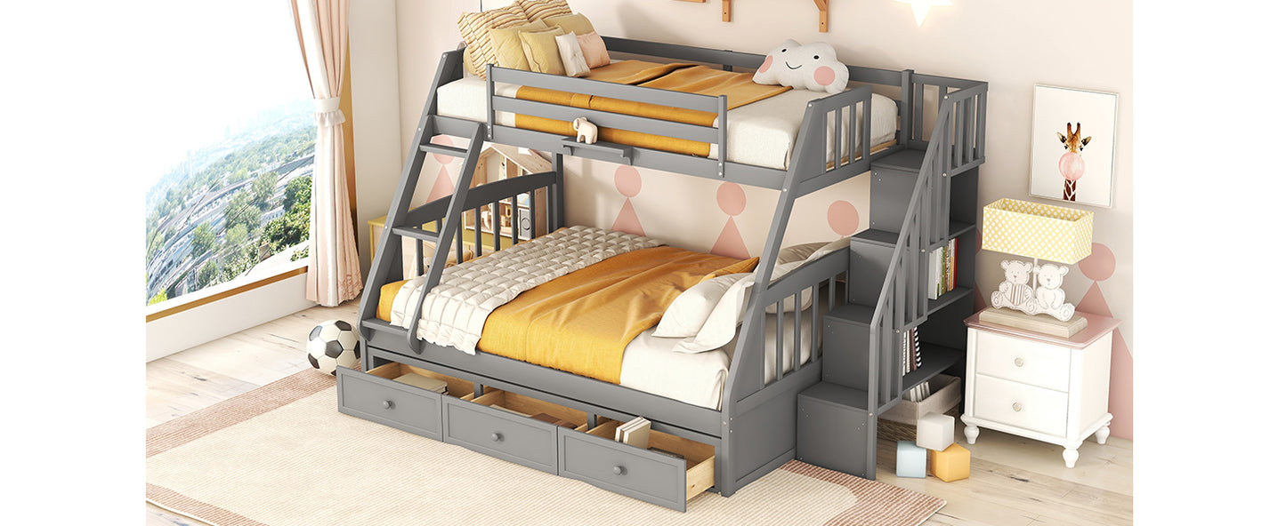 Gray triple bunk bed with stairs and storage drawers perfect for kids bedrooms