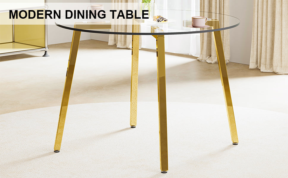 Round glass dining table with gold metal legs