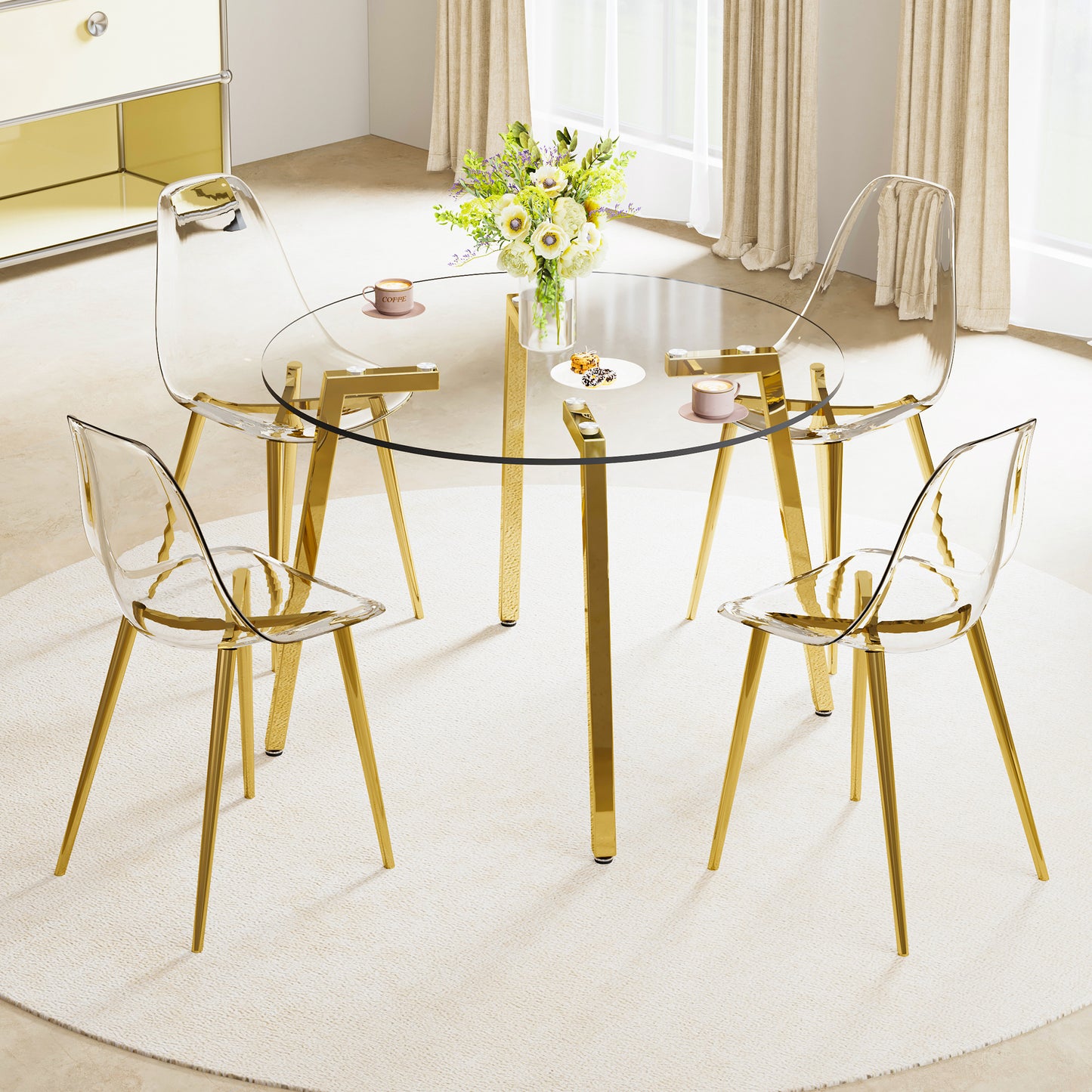 Clear acrylic dining chairs with gold metal legs arranged around a glass table