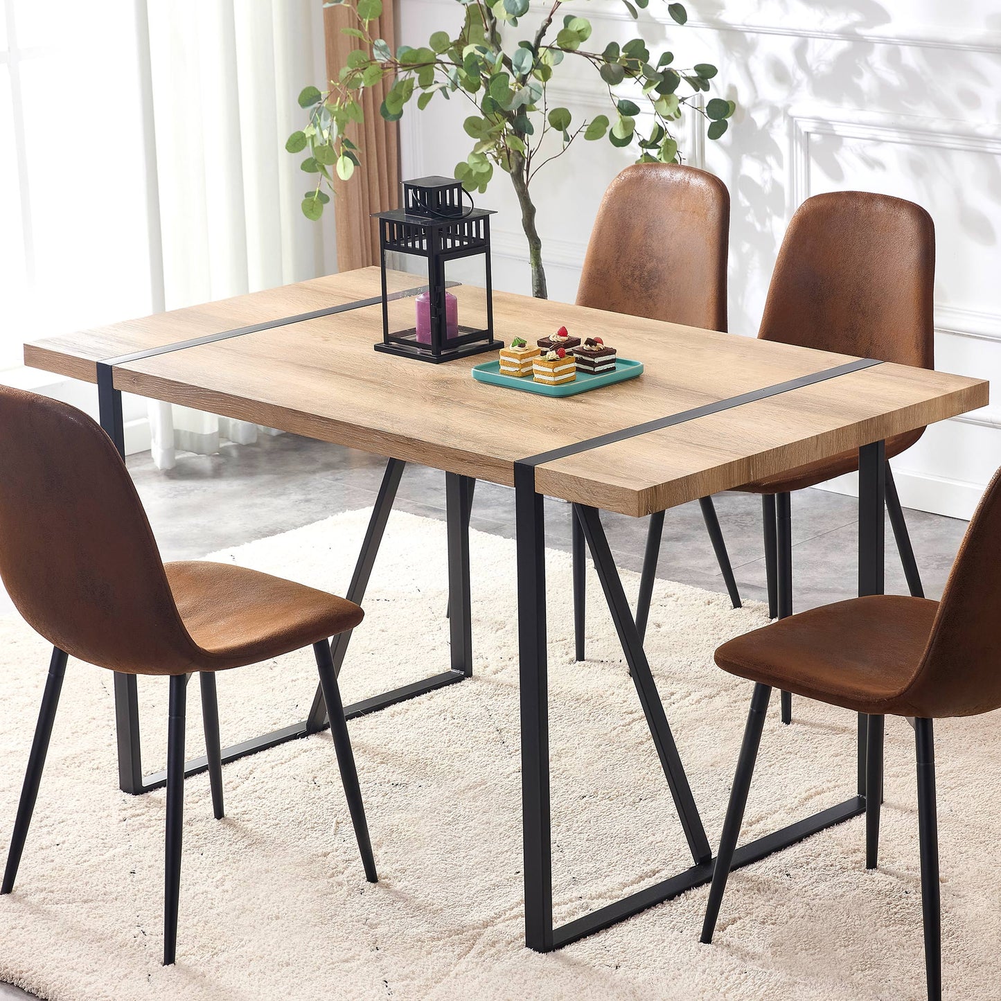 Oak dining table with black metal legs seats four guests comfortably